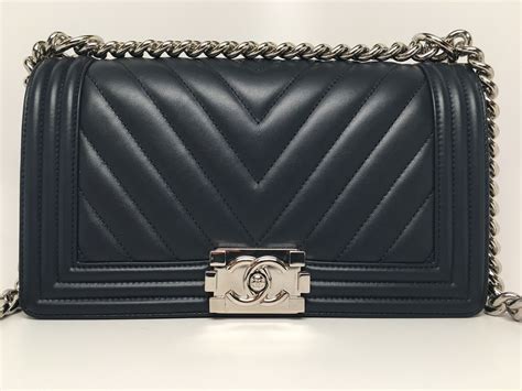 chanel chevron boy bag navy|white chanel boy bag.